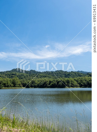 The small, quiet lake of the reservoir is set in a The small, quiet lake of the reservoir is set in a 69913431
