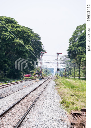 The automatic railroad crossing on the local road. The automatic railroad crossing on the local road. 69913432