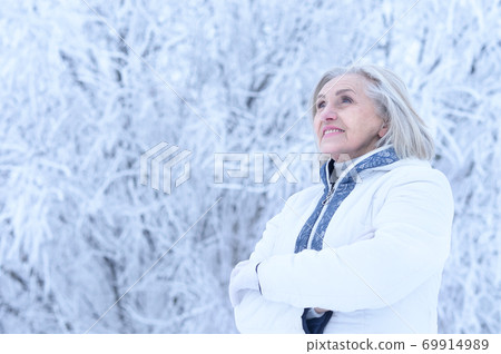 Portrait of cute happy beautiful senior woman Portrait of cute happy beautiful senior woman 69914989
