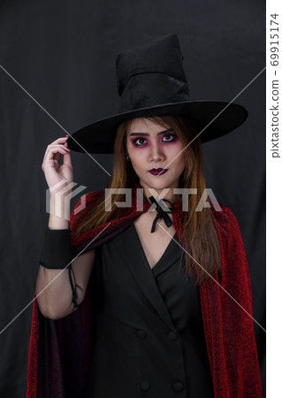 Portrait of asian woman in halloween cloth Portrait of asian woman in halloween cloth 69915174