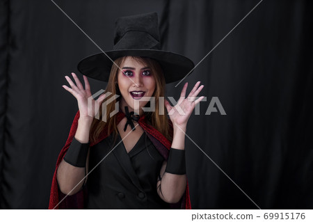 Portrait of asian woman in halloween cloth Portrait of asian woman in halloween cloth 69915176
