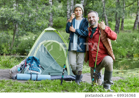Father and Son Enjoying Outdoor Tourism Father and Son Enjoying Outdoor Tourism 69916368