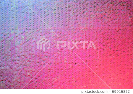 Colorful abstract sequins background in neon light. Bright holiday backdrop for your design. Holiday banner design. 69916852