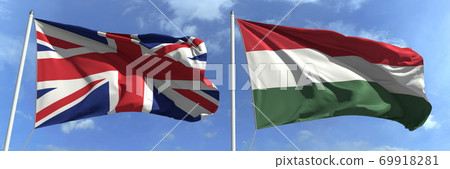 Waving flags of Great Britain and Hungary on flagpoles, 3d rendering Waving flags of Great Britain and Hungary on flagpoles, 3d rendering 69918281