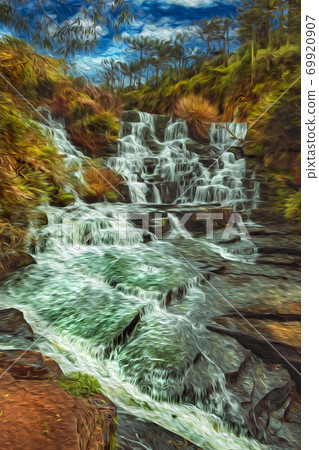 Waterfall falling over rocks in a lush forest 69920907