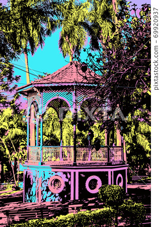 Old bandstand amid a lush garden 69920937