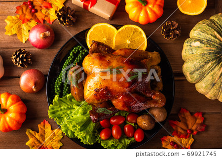 Thanksgiving roast turkey or chicken and vegetables Thanksgiving roast turkey or chicken and vegetables 69921745