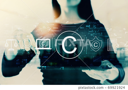Copyright concept with businesswoman 69921924