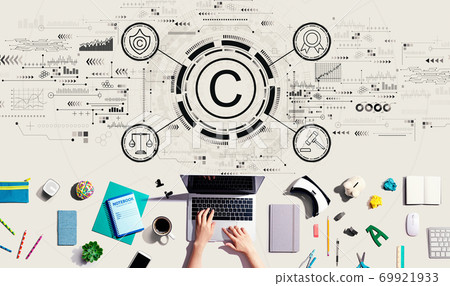 Copyright concept with person using a laptop 69921933
