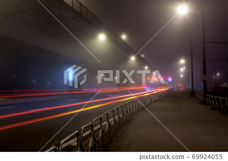 Busy street with fog 69924055