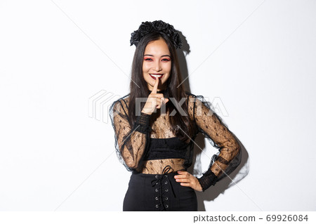 Smiling beautiful asian woman in black lace... - Stock Photo [69926084] -  PIXTA