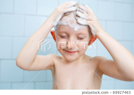 little boy washes in the shower little boy washes in the shower 69927463