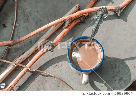The cup of hot coffee The cup of hot coffee 69929904
