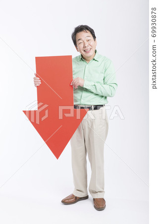 Male with down arrow 69930878