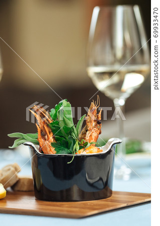 Closeup on spanish dish gambas pil-pil shrimps Closeup on spanish dish gambas pil-pil shrimps 69933470
