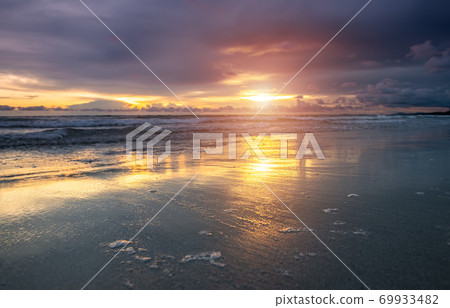 Sea beach in sunset lighting time. Sea beach in sunset lighting time. 69933482