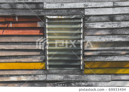 Old house wooden plate wall rustic and decompose. Old house wooden plate wall rustic and decompose. 69933494