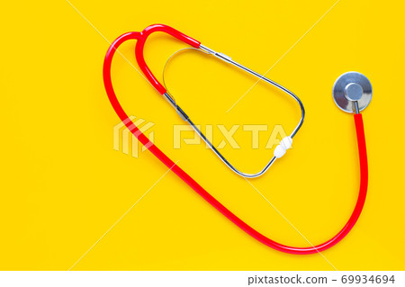 Stethoscope on yellow background. copy space Stethoscope on yellow background. copy space 69934694