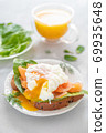 delicious poached egg with salmon fish and orange juice 69935648