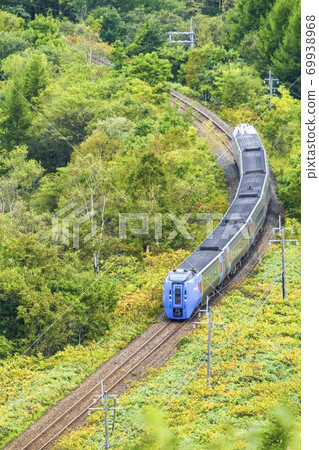 Limited express Ozora seen from Mt. Masuda (283 series) Shintoku-cho, Hokkaido Limited express Ozora seen from Mt. Masuda (283 series) Shintoku-cho, Hokkaido 69938968