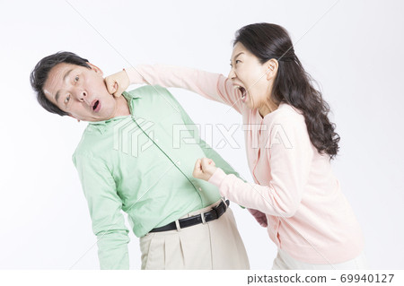 Wife hitting her husband 69940127