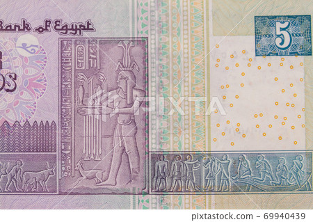 Macro shot of five egyptian pounds bill Macro shot of five egyptian pounds bill 69940439
