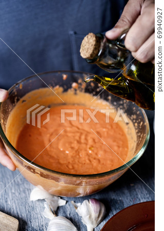 preparing porra antequerana, a cold tomato soup preparing porra antequerana, a cold tomato soup 69940927