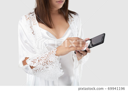 Cleaning mobile phones to eliminate germs. Cleaning mobile phones to eliminate germs. 69941196