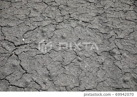 Asphalt road closeup texture Asphalt road closeup texture 69942070