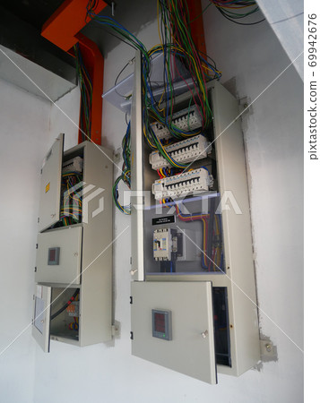 SELANGOR, MALAYSIA -AUGUST 19, 2020: Electrical distribution board and it's component in the installation process. Electrical wireman will install this equipment according to the electrical engineer d 69942676