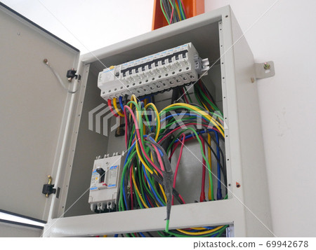 SELANGOR, MALAYSIA -AUGUST 19, 2020: Electrical distribution board and it's component in the installation process. Electrical wireman will install this equipment according to the electrical engineer d 69942678