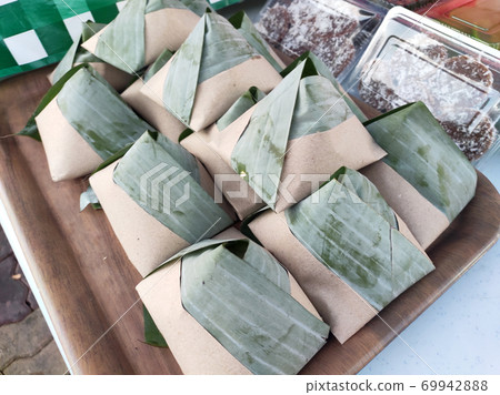 Nasi lemak. Is a signature food in Malaysia. Often eaten as breakfast. Nasi lemak is usually served with sambal, eggs and anchovies. 69942888