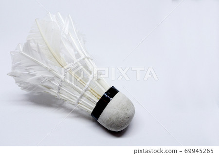 Shabby shuttlecock. Some of the feathers have been damaged and lost. Shabby shuttlecock. Some of the feathers have been damaged and lost. 69945265