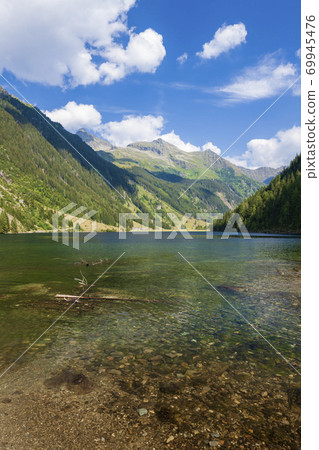 Alpine mountain lake Riesachsee near Schladming in Austria Alpine mountain lake Riesachsee near Schladming in Austria 69945476