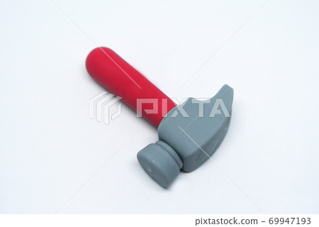 Selective focused, an image of toy hammer made from red and grey soft rubber isolated on white background. Selective focused, an image of toy hammer made from red and grey soft rubber isolated on white background. 69947193