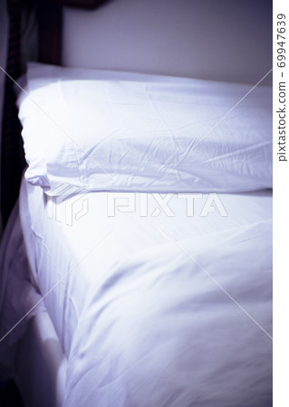 Open bed with bed sheets off Open bed with bed sheets off 69947639