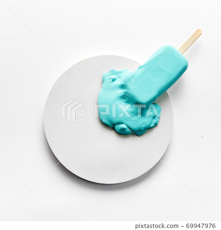 Aqua color melted ice cream. Minimal concept color of the Year. 69947976