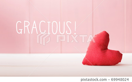 Gracious - Thank you in Spanish language with a red heart cushion Gracious - Thank you in Spanish language with a red heart cushion 69948024
