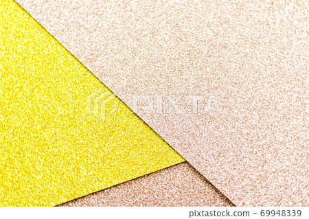 Blush pink and yellow shiny glitter paper background, abstract and holiday backdrop 69948339