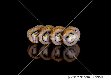 Fresh delicious beautiful sushi rolls on a dark background 69950350