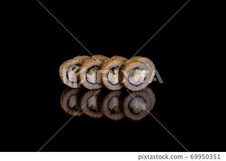 Fresh delicious beautiful sushi rolls on a dark background 69950351