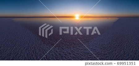 Seagulls on sunset Genichesk pink  salty lake, Ukraine 69951351