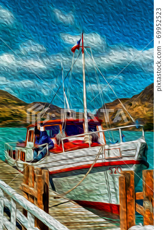 Small boat anchored on pier in a lake 69952523