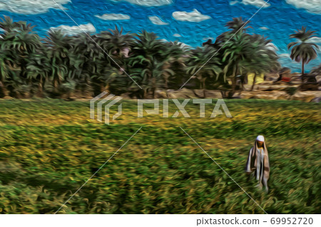 Egyptian man on a field near Luxor Egyptian man on a field near Luxor 69952720