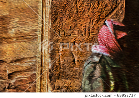 Bedouin and old stone wall in Petra Bedouin and old stone wall in Petra 69952737