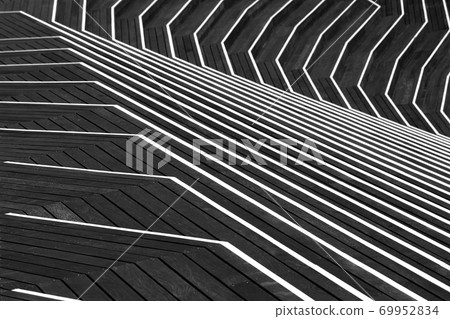 Stepped wooden deck with intricate design 69952834