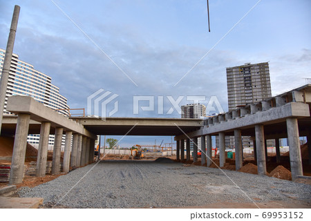 Roundabout and traffic bridge construction. 69953152