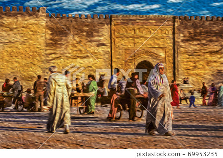 People in front of the wall and gate in Meknes People in front of the wall and gate in Meknes 69953235