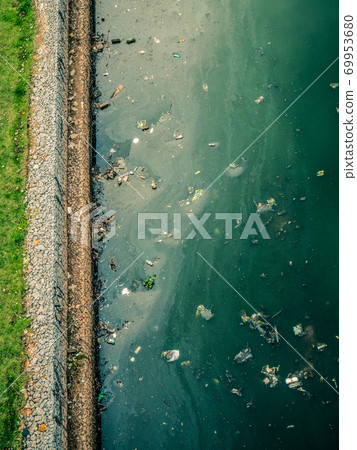 Top view of Pinheiros River Bank Pollution and Rocks 69953680