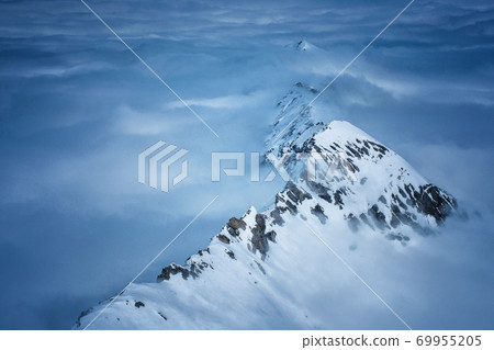 Stunning Panoramic view Snow moutain of the Swiss Skyline from Piz Gloria Schilthorn, Switzerland 69955205
